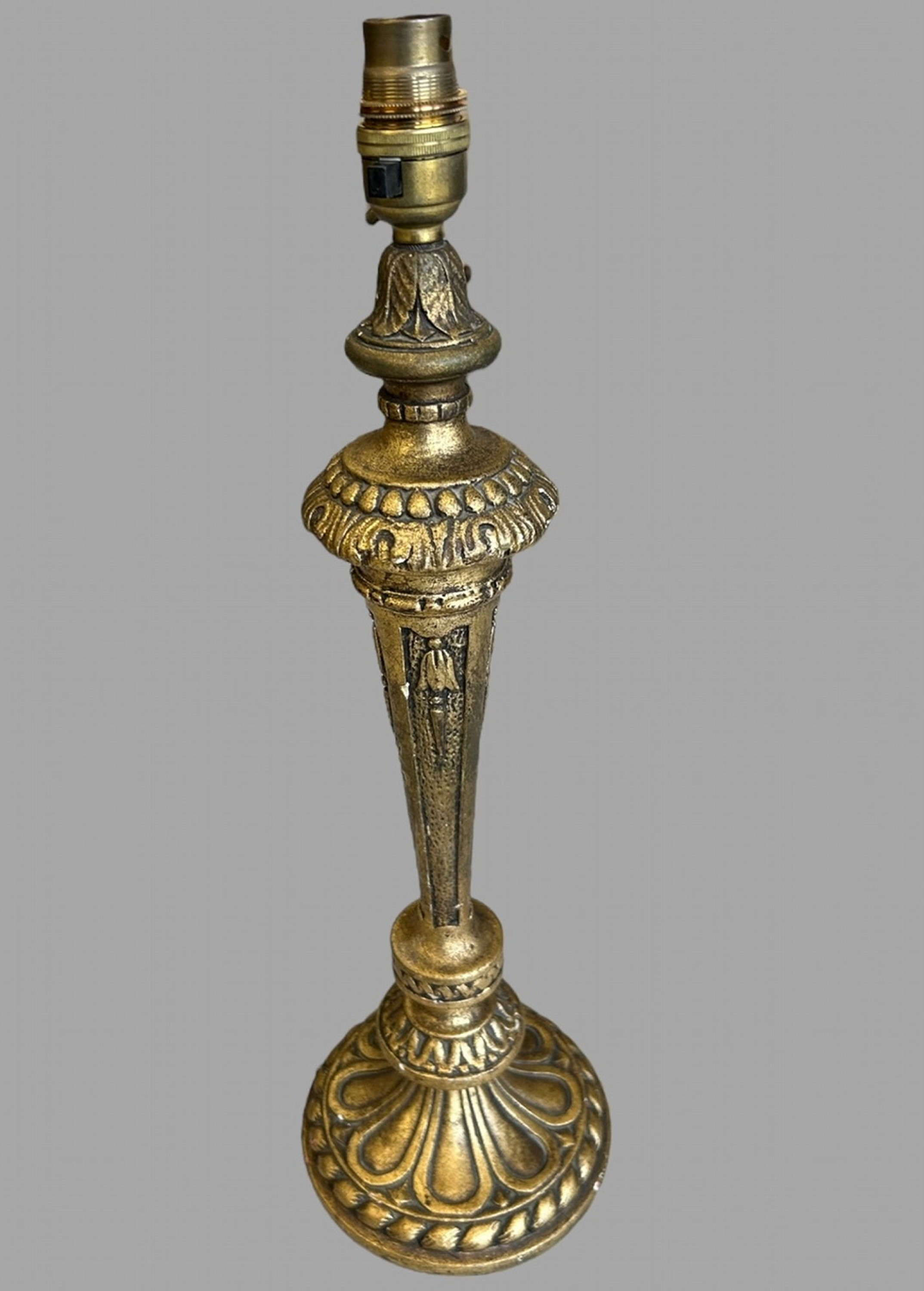 A Giltwood Candle Stick-Shaped Lamp