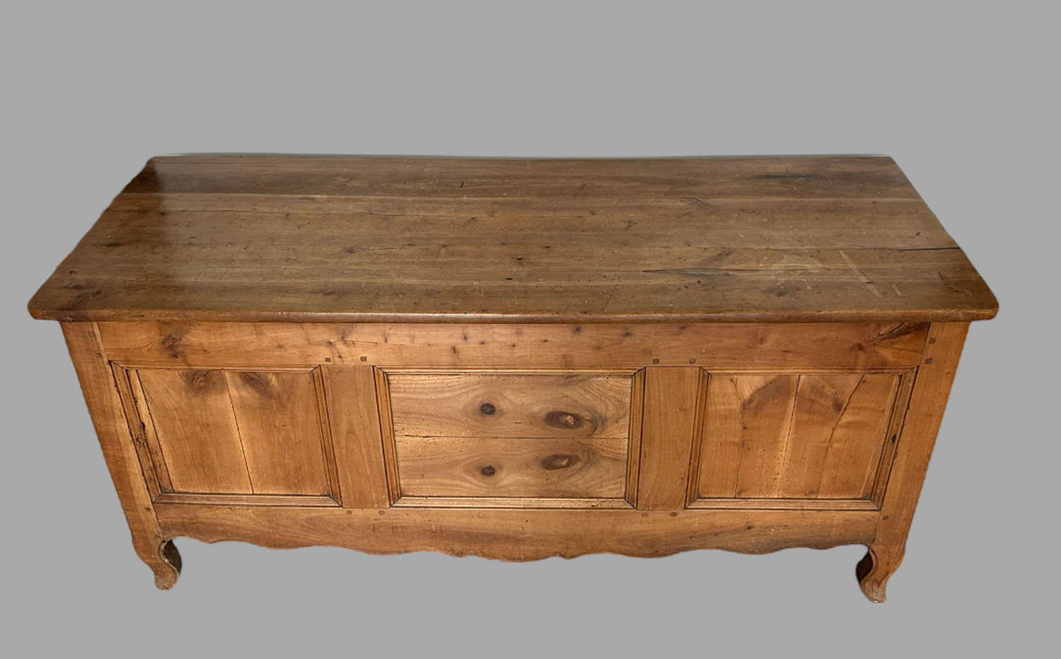 A Large Fruitwood Panelled Chest