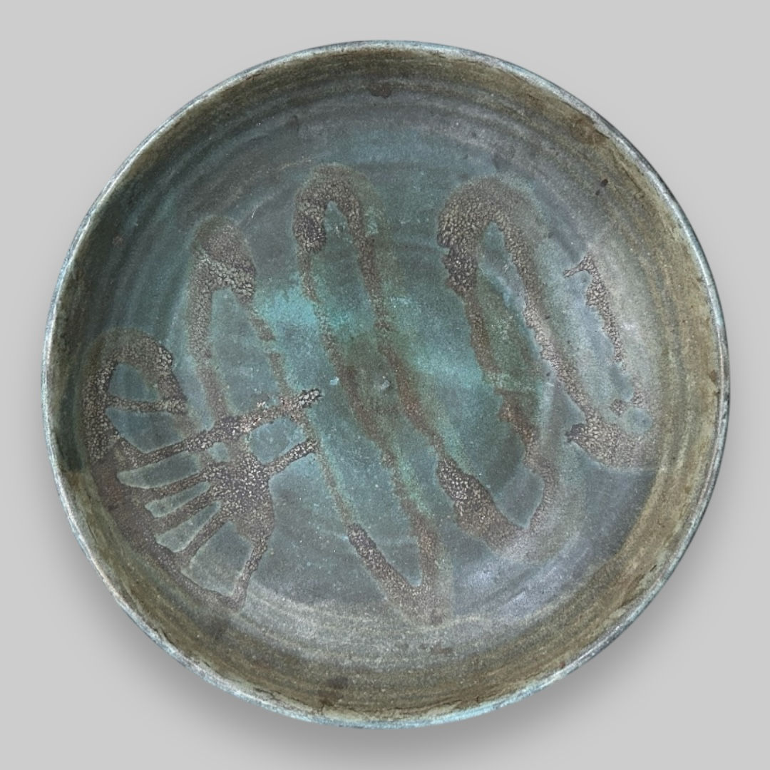 A Large Shallow Ceramic Bowl