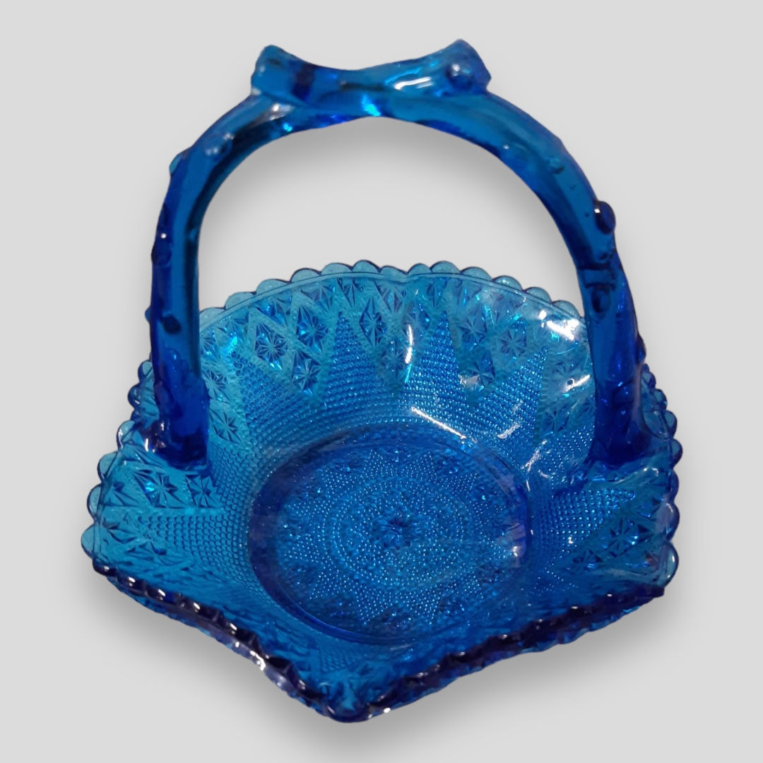 A Single Cobalt Blue Glass Basket with Stylised Bark Handles