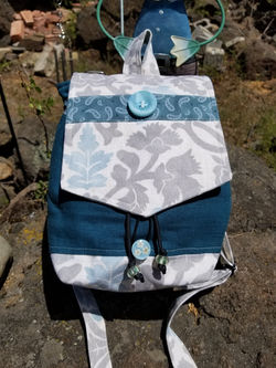 medium teal & silver backpack