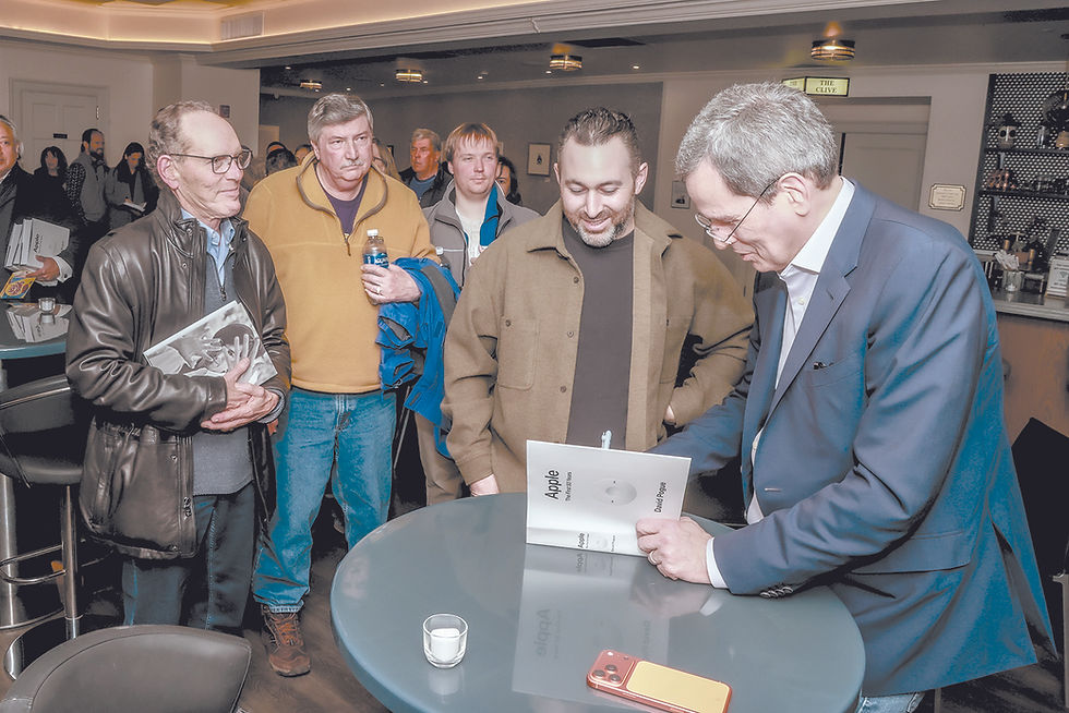 The author signs books at the Bedford Playhouse. PETER T. MICHAELIS PHOTO