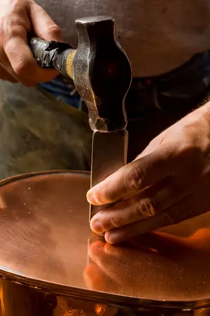 Close-up of handcrafted copper work
