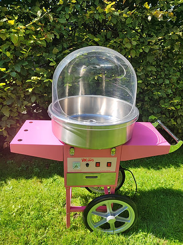 Rosa Zuckerwattemaschine mit Wagen