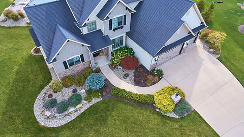 image-view-outside-traditional-american-house-with-beautiful-summer-landscaping.jpg
