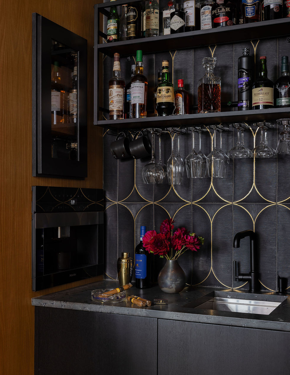 Moody custom home bar in Uptown Charlotte condo, designed by Tailored Designs, a luxury North Carolina interior design firm.