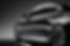 shiny-black-car-polished-with-dark-isolated-background-website-print-design.jpg