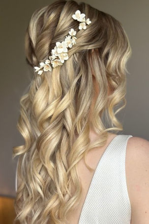 Half up half down hairstyle with curls