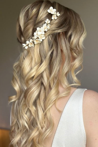 Half up half down hairstyle with curls