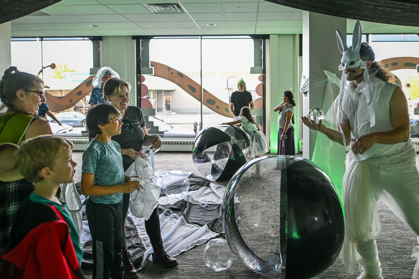 Attendees dance and play at Sylvan Passage, part of the Immersive Experience Project.