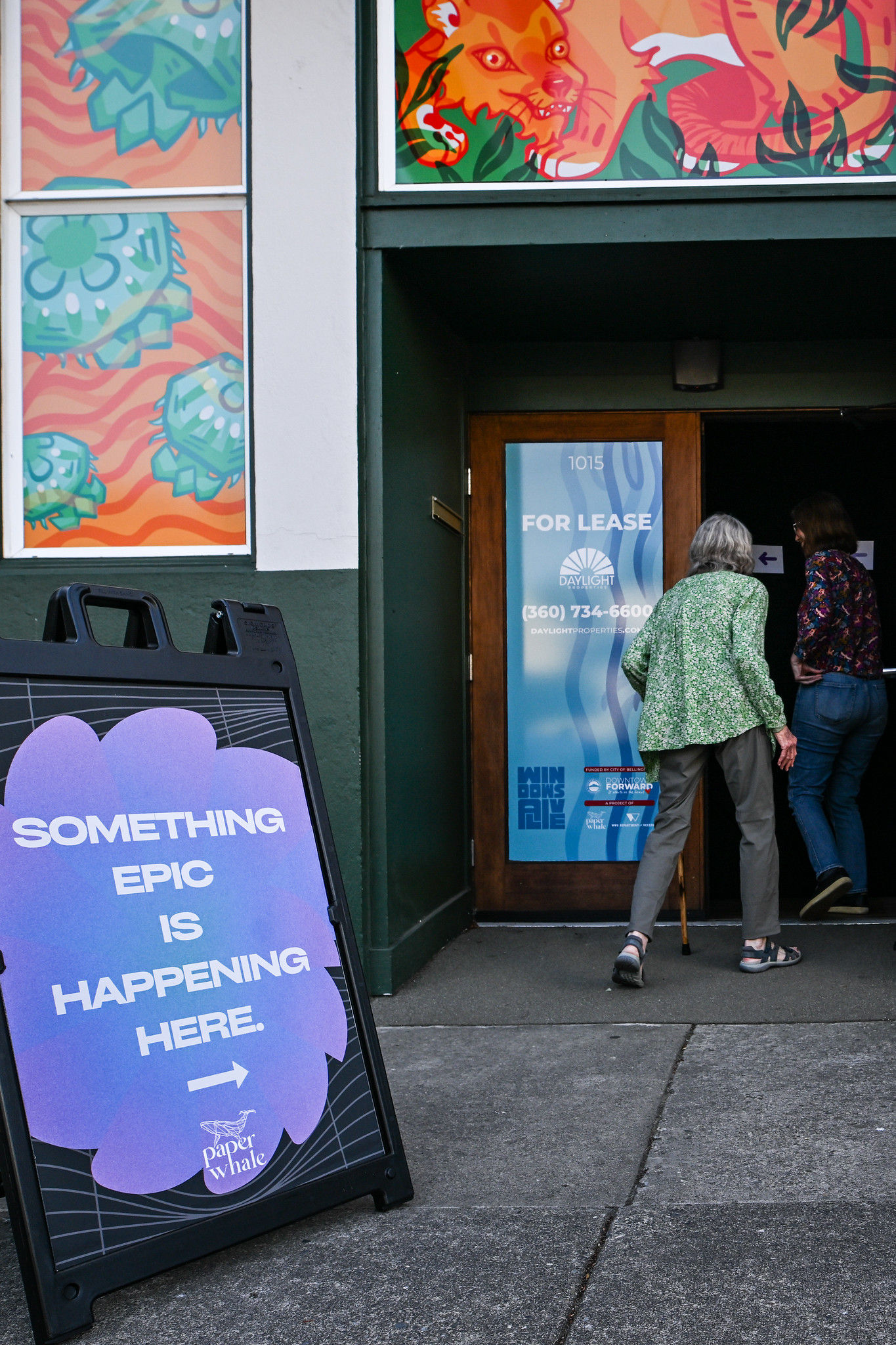 Passersby step inside one of four locations featured in the Immersive Experience Project.