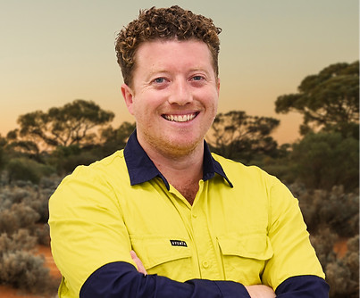 Alex Headshot_W Background.jpg