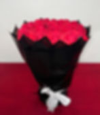 Elegance bouquet – luxury red roses wrapped in black paper with white ribbon, same-day delivery in Los Angeles Gabys Flowers