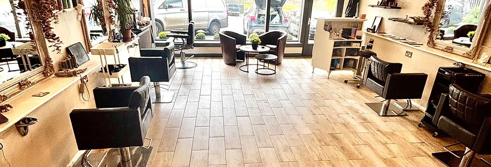 Headrush's Modern hair salon interior with styling stations and wash basins