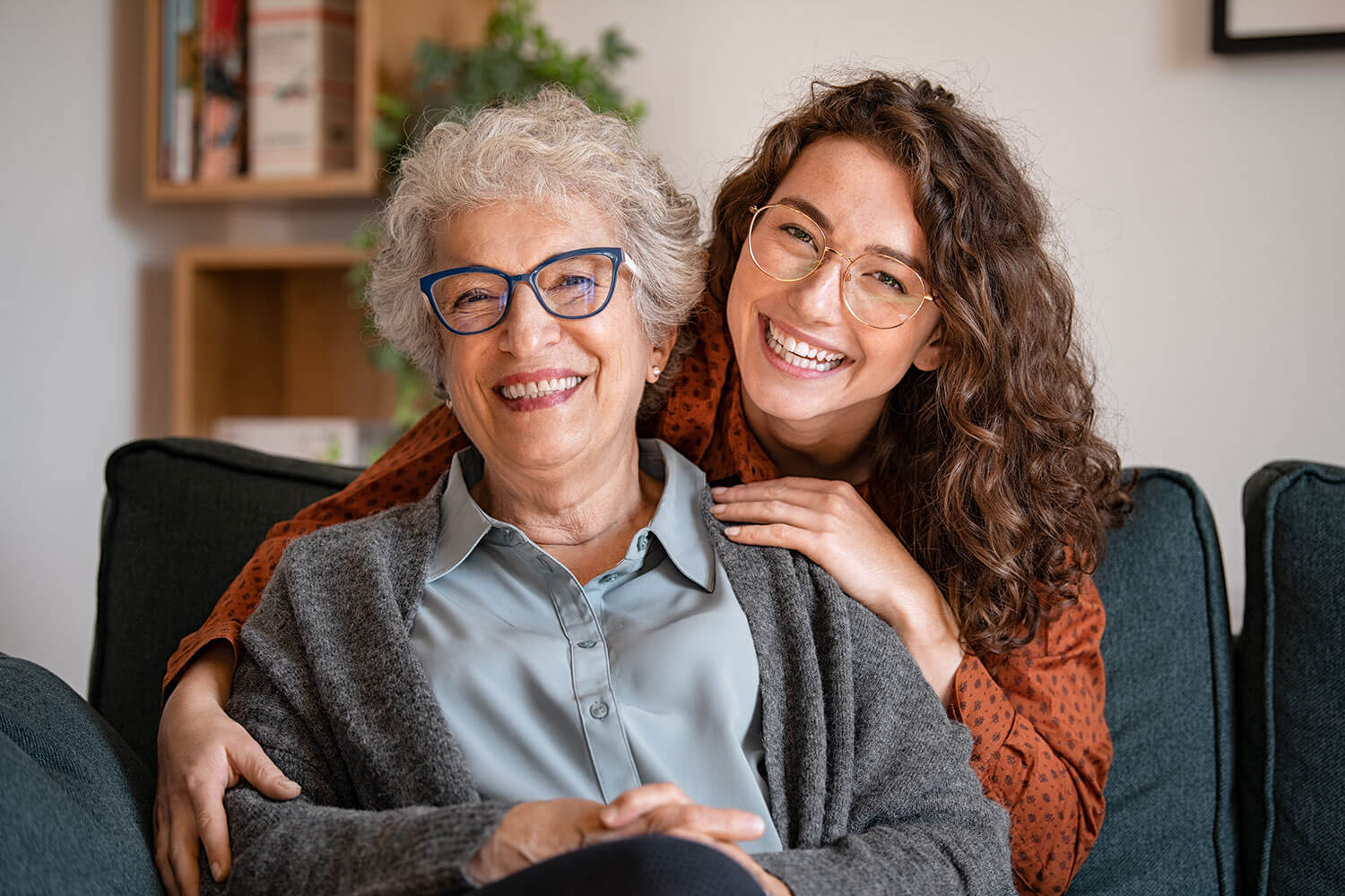 Smiling grandmother and granddaughter together