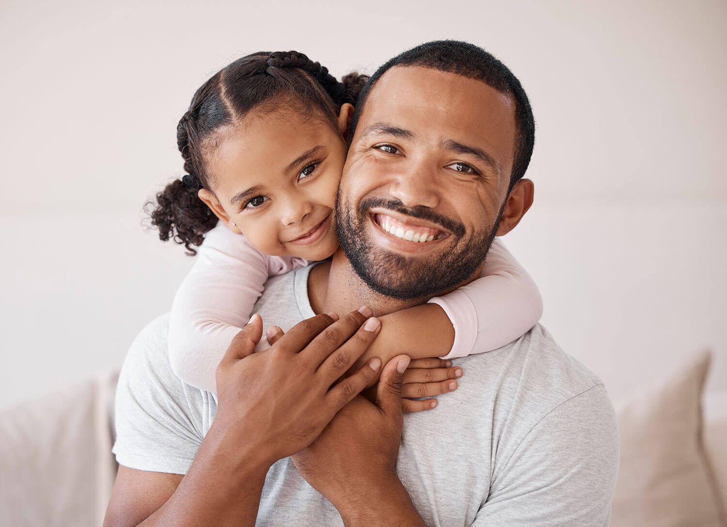 Father and daughter smiling together