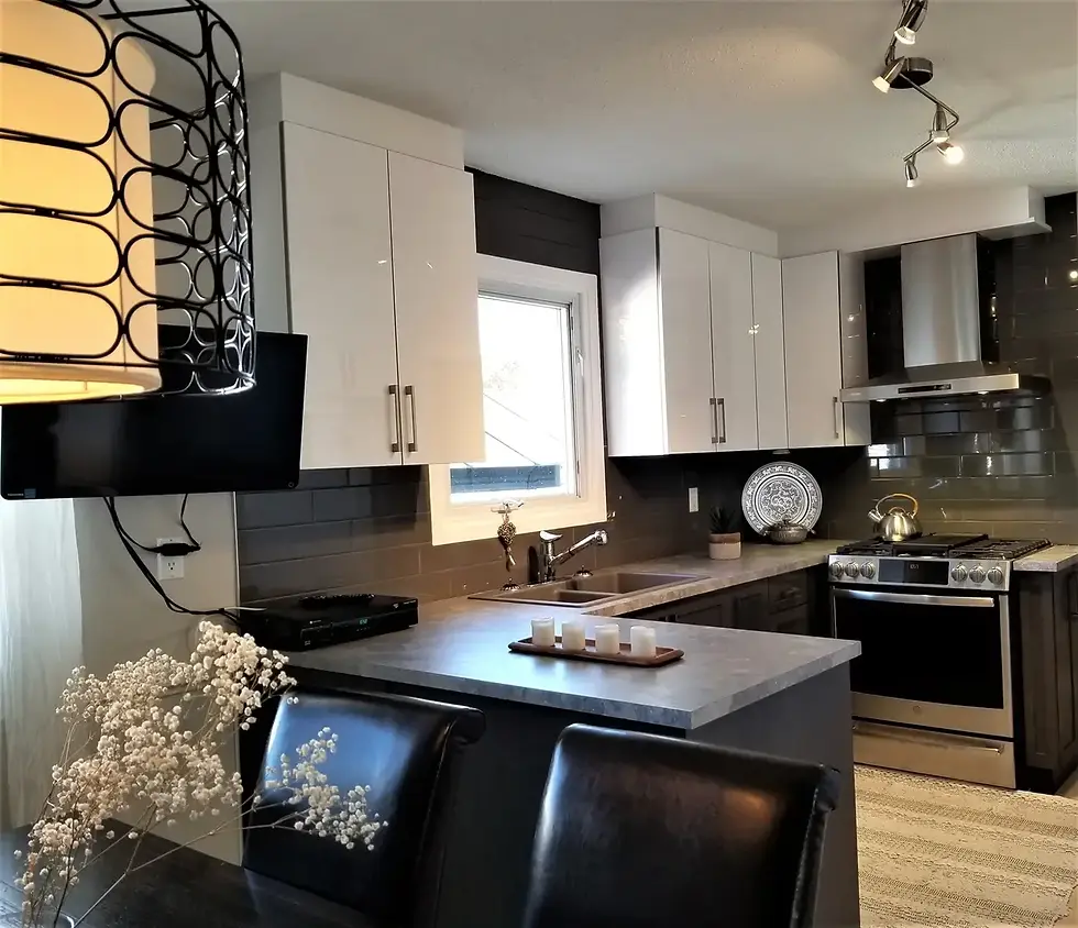 Open living space with integrated kitchen cabinets