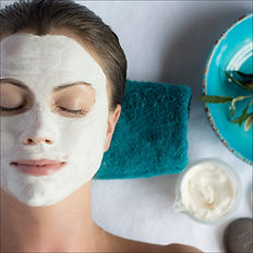 Woman enjoying a relaxing facial treatment