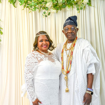 “Couple holding hands at the altar during an emotional wedding ceremony, captured by PJ Photography”