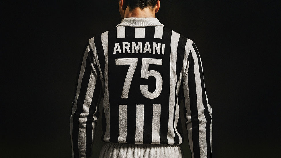 The back of a soccer player wearing a black and white striped Juventus kit that says "Armani" with the number 75