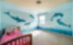 Land and Sea kids room custom designed and painted by mural artist in Austin, Texas