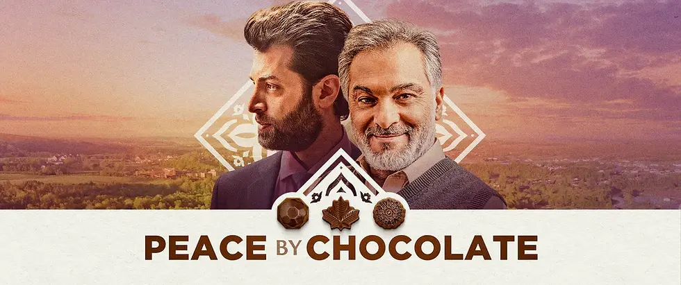 Movie poster for "Peace by Chocolate" with two men standing together with a sunset landscape behind them.