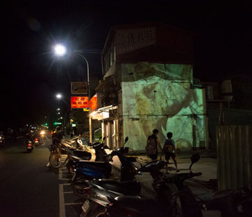 Asian elephant projected on the side of a street in Taipei, Taiwan