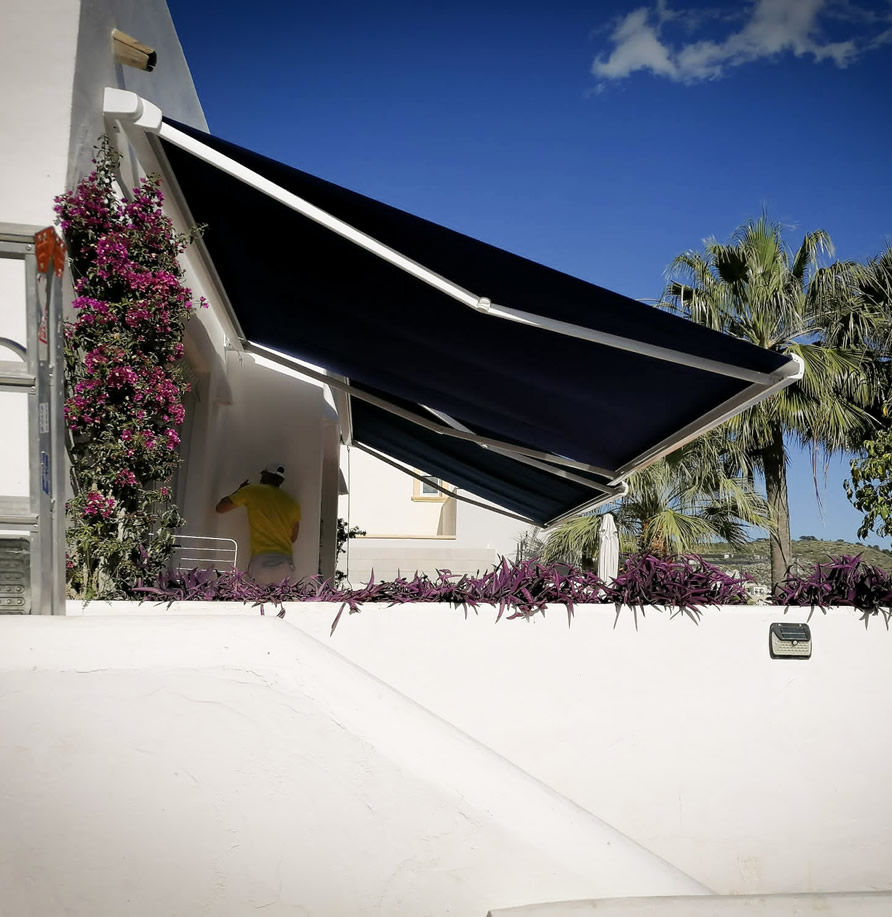 Toldo retractil / toldo brazo oculto Cancún, Playa del Carmen, Puerto Aventuras, Tulum.
