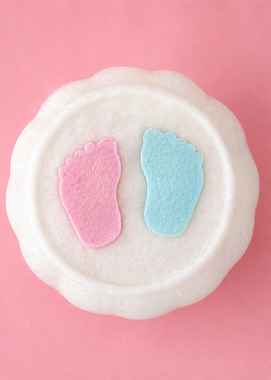 Gender revealcandy floss cake with pinkn blue feet decoration