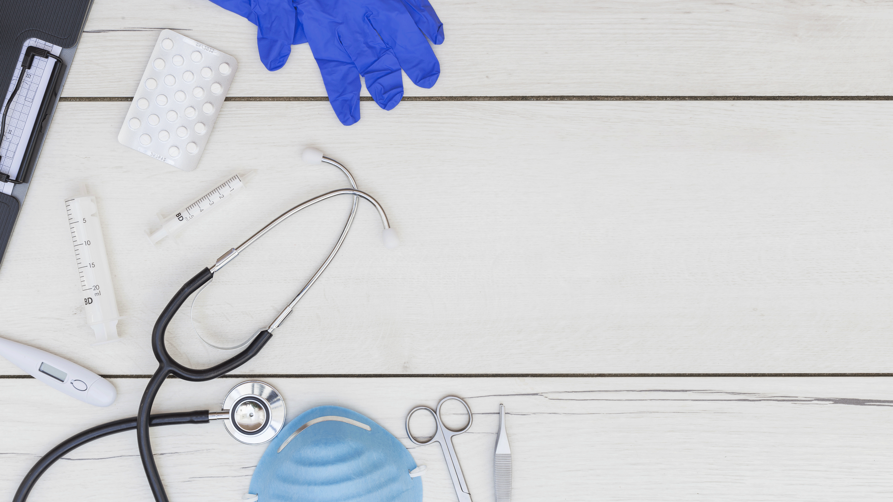 pills-medical-equipment-s-white-wooden-desk.gif
