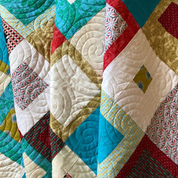 Modern squares quilt with circular pantograph