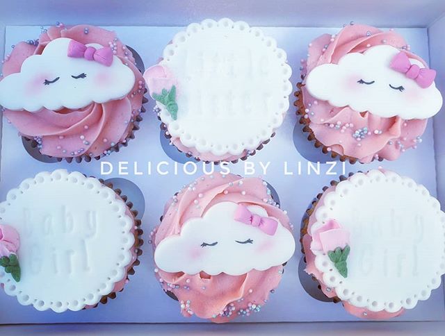 Fluffy clouds and pink swirls to celebra