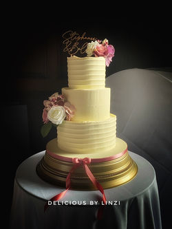 Rustic buttercream 3 tier with Mauve florals