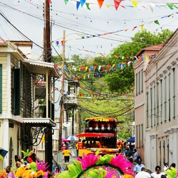 St. Thomas Carnival parade float moving through colorful decorated streets of Charlotte Amalie.