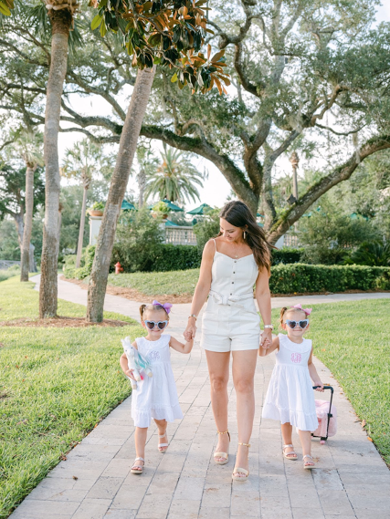 Racquel Frisella walking with daughters