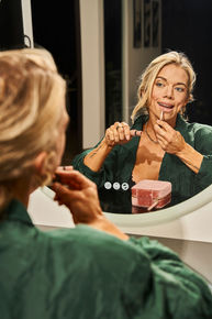 Mirror image of woman