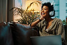 woman smiling with headphones on