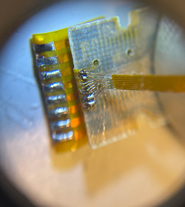 view of an alternate e02 repair involving the use of jumper wires across the broken portion of cable
