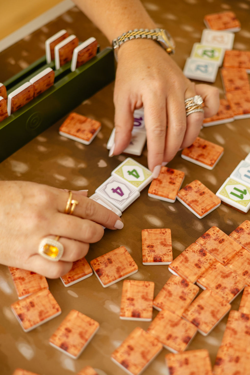 Missy Mahjong teaches tile rummy rules in a quick-start guide.
