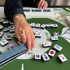 Pick tiles from the mahjong wall.