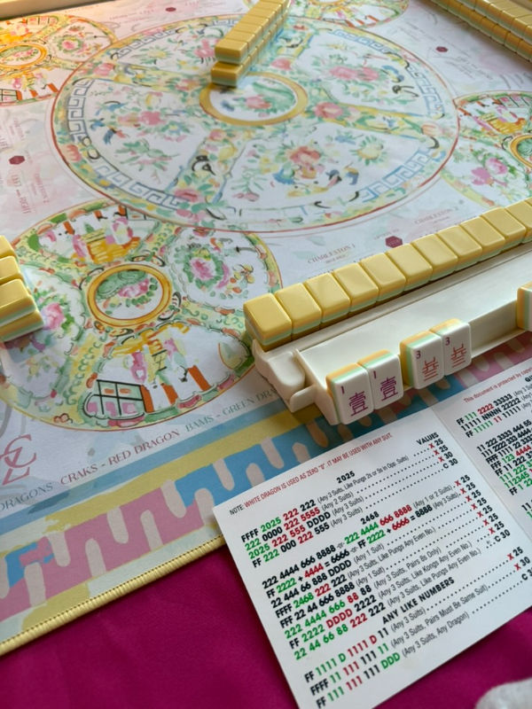 Learn to play American mahjong with a mahjong teacher.