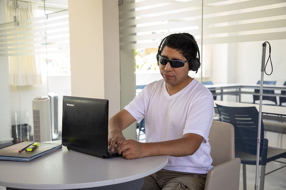 person with vision impairment working.jpg