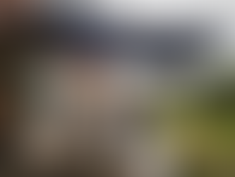 UK family enjoying shaded outdoor patio