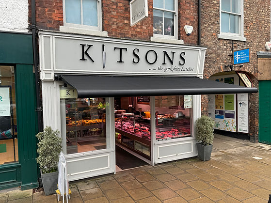 Black Commercial Awning installed on a Butchers Shop in Yorkshire