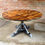 Thumbnail: Scissor-Tail Round Dining Table