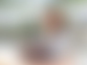 woman smiling looking at computer