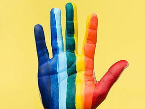 Rainbow painted hand, diversity symbol