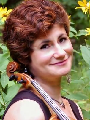 Born in Russia, violinist Anna Gendler received her musical education at the celebrated Moscow Conservatory, where she studied under Mikhail Kopelman, a member of the world-renowned Borodin Quartet.
In 1991, she began her tenure with the Tucson Symphony Orchestra, in which she plays violin. She and her husband, the accomplished pianist Alexander Tentser, currently live in Tucson, Arizona, where they are raising their family and contributing in a variety of ways to the enrichment of the city’s musical culture, recently performing for the Arizona Friends of Chamber Music.
Gendler is a faculty member at Pima Community College and a teaching artist for the OMA Foundation. A studio teacher with a devoted following of private students, she has also served as a violin instructor for The Symphony Women’s Association, and—at the invitation of its founder—she has taught for Arizona Music and Dance Academy.
In addition to teaching, Gendler has given frequent public performances as a member both of the Tucson Symphony String Quartet and its Flute Trio, and she and her husband collaborate regularly in piano and violin duets. Finally, she is a founding member of Daystar Chamber Players, plays with Tucson Chamber Artists, and is currently planning a series of performances with various groups for next season.
Gendler also performs nationally. She has been a guest artist (alongside her husband) in WFMT’s Dame Myra Hess Memorial Concert Series; has played with the Phoenix Symphony; contributes to the Arizona Musicfest in Carefree, Arizona; and participates in the “Music in the Mountains” SummerFest in California’s Gold Country and the Lake Placid Sinfonietta annual concert series in Upstate New York.