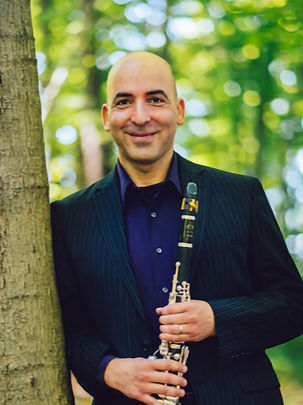 Clarinetist Amitai Vardi, an avid soloist, orchestral, and chamber musician, serves as Associate Professor of Clarinet at Kent State University. Vardi made his solo debut at the age of sixteen with the Madison Symphony Orchestra. He has since won several concerto competitions and was a featured soloist with The CIM Orchestra, the Round Top Symphony Orchestra, the Spoleto Symphony Orchestra, the Blue Water Chamber Orchestra, and with members of the Pittsburgh Symphony Orchestra.
As an orchestral player, Vardi served as principal clarinetist of Red {an orchestra}, Opera Cleveland and Lyric Opera Cleveland. He currently holds the position of principal clarinet with the Blue Water Chamber Orchestra and the Erie Philharmonic. Vardi has performed with many orchestras, including the American Ballet Theatre, Joffrey Ballet, The Chautauqua Symphony Orchestra and The Cleveland Orchestra, with which he performed well over 150 concerts including many tours. During the 2014-2015 season, Vardi substituted with TCO on bass clarinet for most of the season.
His enthusiasm for chamber music has led to performances across the United States, South America, and Europe. He is featured in several chamber music CDs, including a recent release on the Delos label with his father, cellist Uri Vardi.
Vardi received his Bachelor of Music degree from Indiana University, where he studied with Eli Eban and his Master of Music degree at The Cleveland Institute of Music, as a student of Franklin Cohen. Mr. Vardi pursued his post-graduate studies with Yehuda Gilad in Los Angeles.