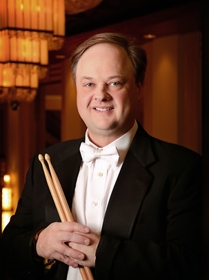Tony Oliver returns for his 26th season with the Lake Placid Sinfonietta.
When not in Lake Placid, Tony is a member of the Quad City Symphony Orchestra (IA/IL) and Associate Professor of Music at Augustana College in Rock Island, Illinois, where he teaches and directs a variety of music courses, ensembles, and all things percussive.
He is proprietor of Curving Walkway Publications, an imprint distributing his own and colleague’s works for percussion and winds, and an artist with Pearl/Adams percussion.
He holds degrees from the University of Iowa (BM, MA) and the Mason Gross School of the Arts at Rutgers University (DMA).